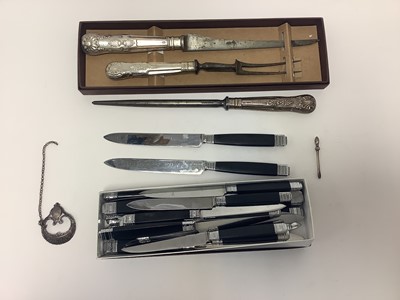 Lot 387 - Edwardian three piece silver handled Kings pattern carving set (Sheffield 1906), Georgian silver Sherry label and a set of modern French knives