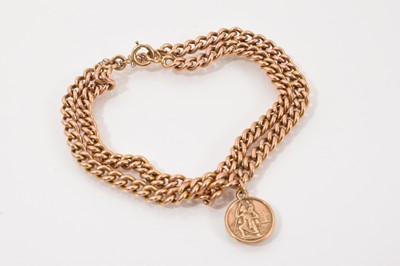 Lot 289 - 9ct gold double curb link bracelet with 9ct gold St. Christopher fob