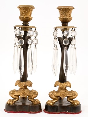 Lot 722 - Pair of Regency ormolu and bronze mounted candlesticks