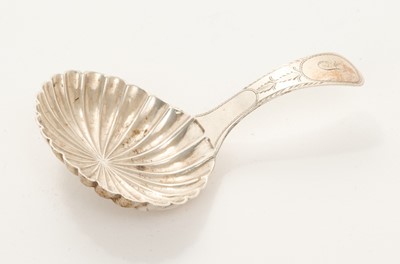 Lot 228 - George III silver caddy spoon with shell bowl and Bright Cut handle with engraved initial (Birmingham 1808) Joseph Wilmore. 6cm overall length.