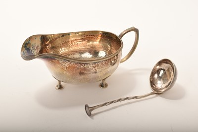 Lot 320 - 1920s silver sideboat and ladle by A E Jones