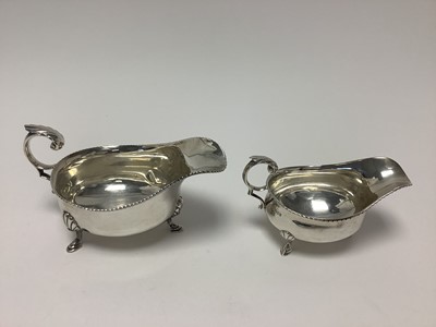 Lot 353 - Two Georgian-style silver sauce boats of graduated size