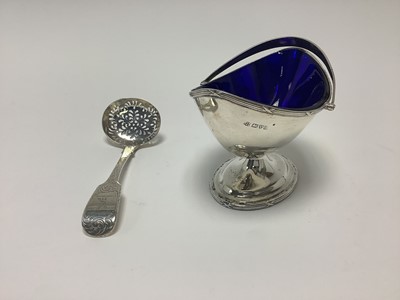 Lot 348 - George V silver sugar basket with blue glass liner, together with a Victorian silver sugar sifter spoon