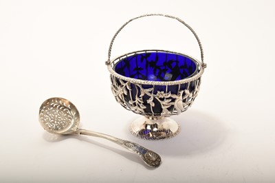 Lot 347 - George II silver sugar basket frame with blue glass liner, together with a William IV silver sugar sifter spoon