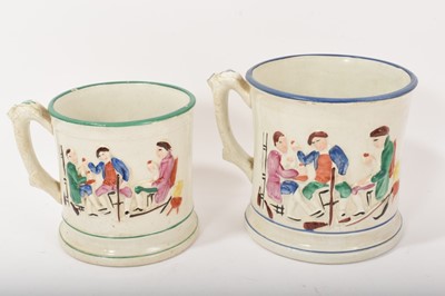 Lot 76 - Two 19th century Staffordshire pottery ‘frog’ mugs
