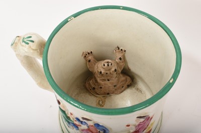 Lot 76 - Two 19th century Staffordshire pottery ‘frog’ mugs
