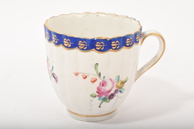 Lot 685 - Derby fluted coffee cup, painted with flowers, blue and gilt border, circa 1775-80, painted mark in blue