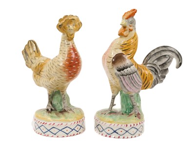 Lot 13 - Unusual pair of Staffordshire pottery models of a cockerel and a hen, circa 1860