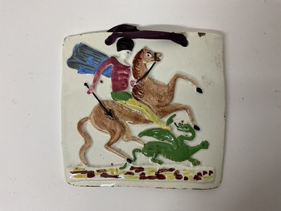 Lot 679 - Scottish pearlware plaque, moulded with St George and the Dragon, circa 1820