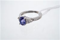 Lot 795 - Tanzanite and diamond ring, the oval mixed cut...