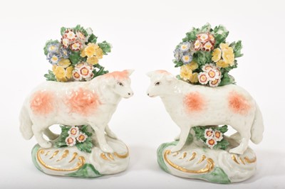 Lot 90 - Pair of continental porcelain models of sheep, circa 1900