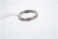 Lot 798 - White gold (18ct) wedding ring / half eternity...