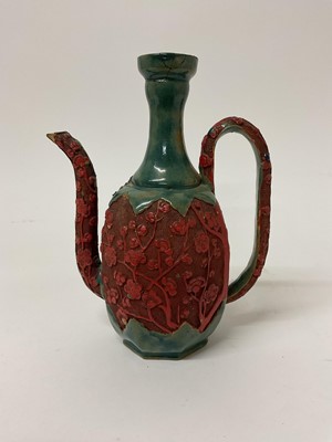 Lot 202 - Pottery ewer, simulating Chinese cinnabar lacquer