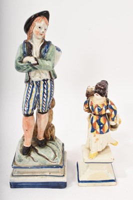 Lot 101 - Two Continental pottery figure toothpick holders