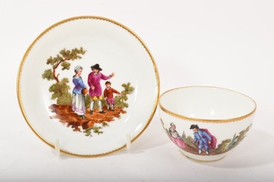 Lot 102 - Continental porcelain cup and saucer, painted in Teniers style, Zurich mark in underglaze blue