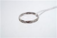 Lot 799 - White gold (18ct) wedding ring / half eternity...