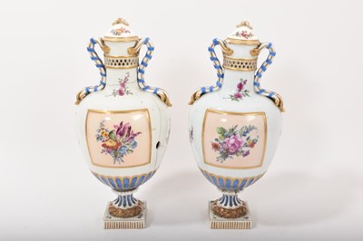 Lot 163 - Pair of German porcelain pot pourri vases and covers