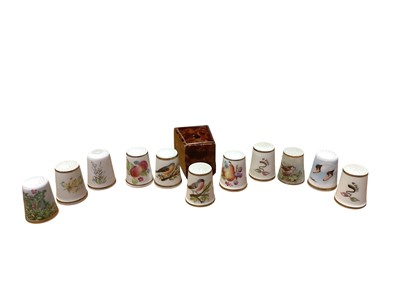 Lot 119 - Collection of 11 Royal Worcester thimbles, and a thimble case