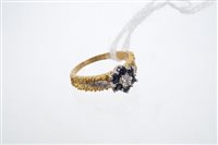 Lot 802 - Gold (18ct) sapphire and diamond flower-head...