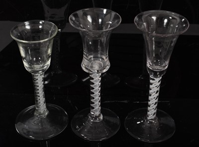 Lot 254 - Three 18th century opaque twist stem glasses