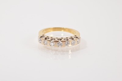 Lot 47 - Diamond eternity ring with a half hoop of seven brilliant cut diamonds in 18ct gold setting