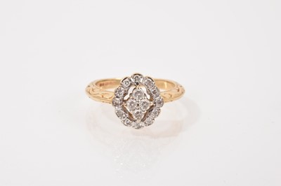 Lot 48 - Edwardian style 14ct gold diamond cluster ring with an oval openwork cluster of brilliant cut diamonds