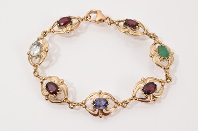 Lot 49 - Victorian style 9ct gold and multi-gem bracelet with oval mixed cut stones to include emerald, aquamarine, sapphire and garnets