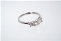 Lot 809 - Diamond three stone ring with three brilliant...