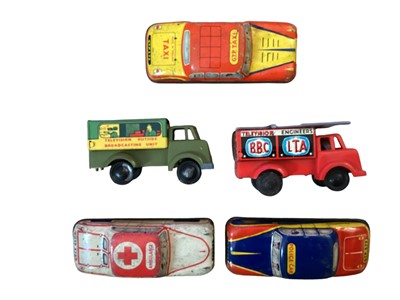 Lot 62 - Tinplate Cragstan Overland Stage Coach battery operated, Peter Pan Automatic chocolate machine, Two Performing Monkiees and some friction cars (qty)