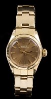 Lot 818 - Ladies Rolex Gold Oyster Perpetual...