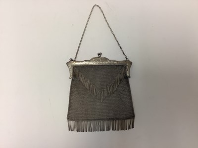 Lot 382 - Edwardian silver purse, with engraved scrollwork pattern and tassel decoration, (London 1904), 17cm wide