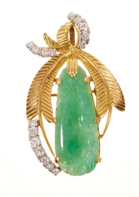 Lot 432 - Carved jade and diamond pendant/brooch, the Chinese caved green jade panel depicitng fruit in a gold mount with textured yellow gold leaves and graduated diamonds, 50mm