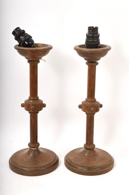 Lot 673 - Pair of early 20th century Arts and Crafts style oak table lamps