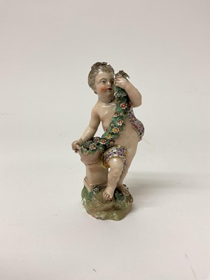 Lot 121 - Derby figure of a garlanded putti, circa 1770