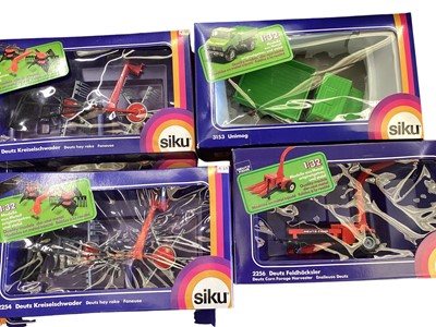 Lot 69 - Diecast boxed selection of SIKU models including farm machinery, Hydraulic Excavator, Combine Harvester etc. (24)