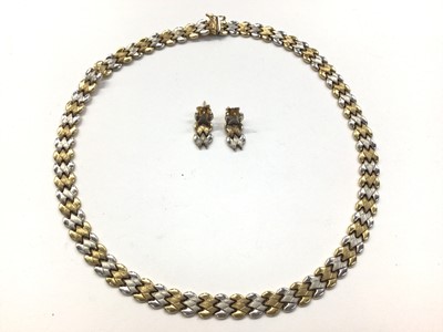 Lot 1027 - 9ct yellow and white gold chevron link necklace and pair of matching earrings