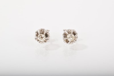 Lot 518 - Pair of diamond single stone stud earrings