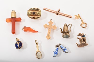 Lot 536 - Group of antique charms to include an early Victorian gold and enamel slide/toggle, gold and enamel ladybird pendant and various others