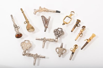 Lot 540 - Group of antique and later watch keys to include a novelty silver flintlock pistol etc