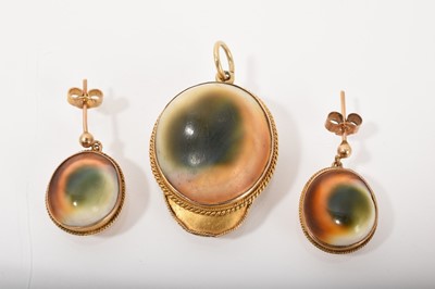 Lot 542 - Antique operculum and gold mounted pendant with glazed compartment to reverse, signed 'Gaunt' and a similar pair of 9ct gold mounted earrings