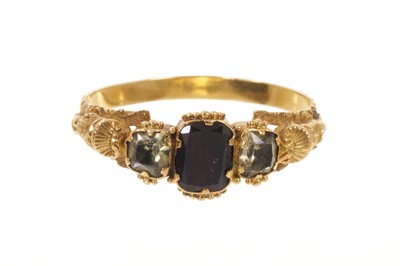 Lot 550 - Regency gold garnet and chrysoberyl three stone ring