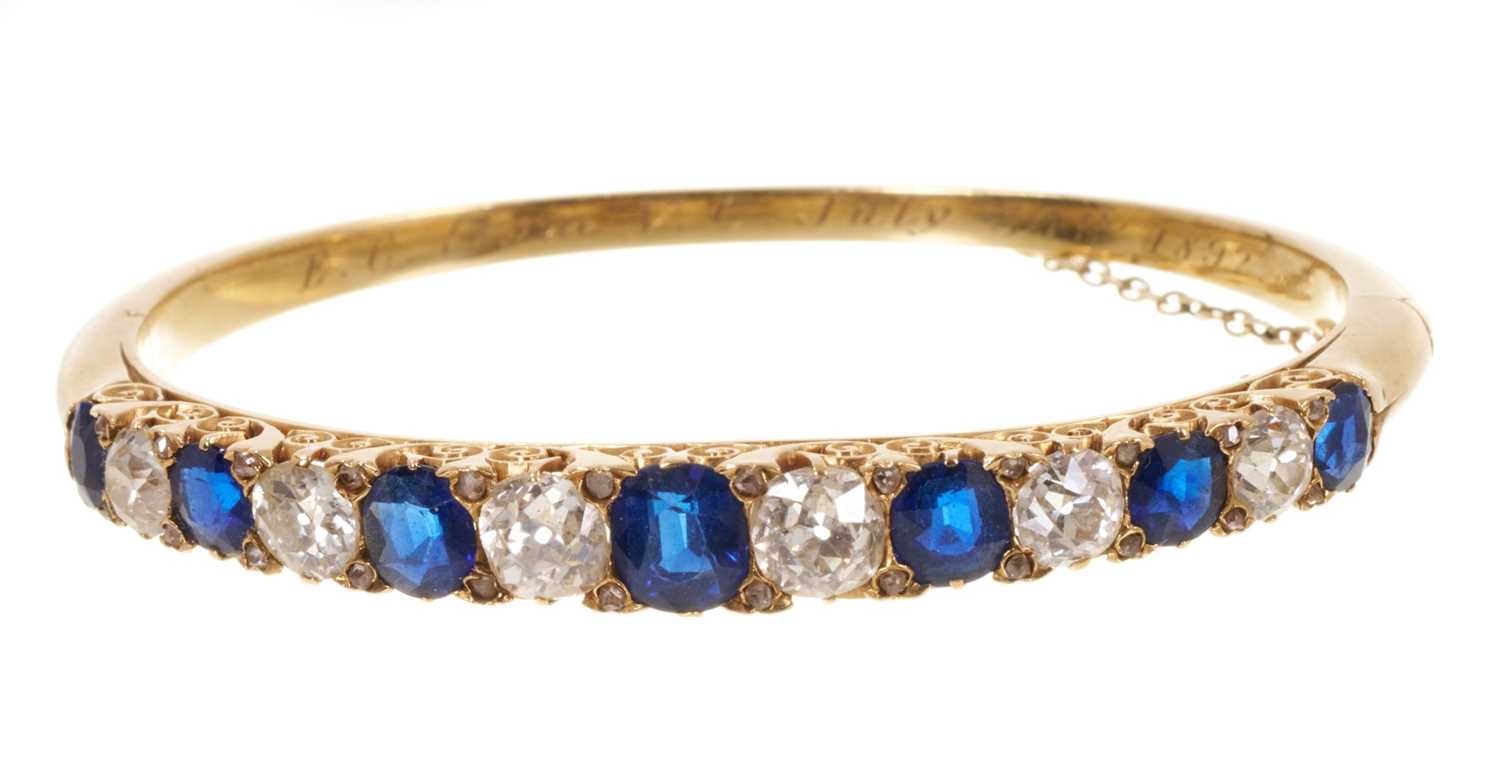 Lot 407 - Fine Victorian sapphire and diamond hinged bangle