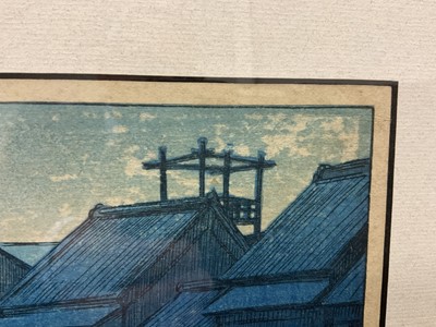 Lot 1043 - Kawase Hasui (1883-1957) colour woodcut print 'Morning in Dotonbori'