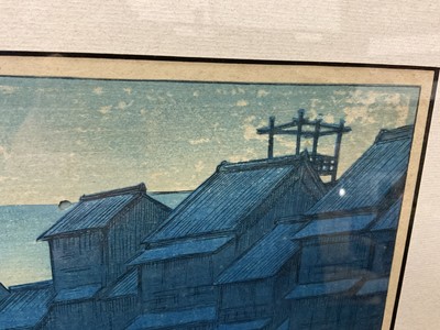 Lot 1043 - Kawase Hasui (1883-1957) colour woodcut print 'Morning in Dotonbori'