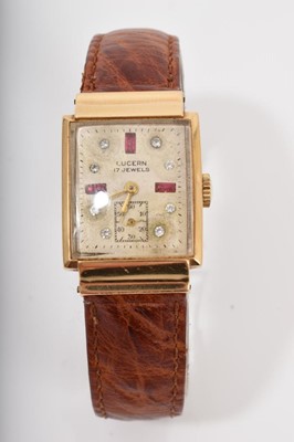 Lot 595 - Art Deco 1940s Lucern 14ct gold wristwatch with jewelled rectangular dial with subsidiary seconds in a tank shape gold case on a brown leather strap