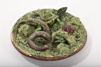 Lot 122 - Small Palissy ware dish decorated with a snake, lizard and beetle, marked 'M. Mafra Caldas Portugal', 18cm diameter