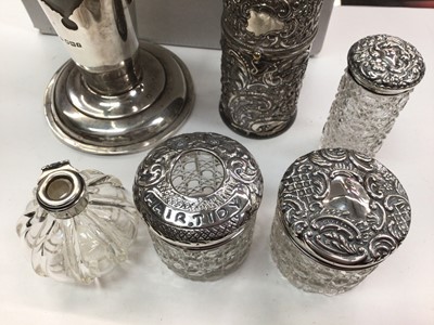 Lot 1053 - Silver mounted glass trumpet vase, four silver mounted glass jars/bottles and a silver plated embossed container engraved 'Mother, Nov 30 1896'