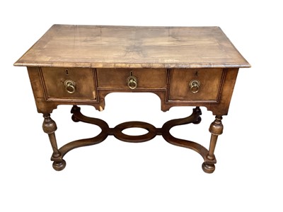 Lot 1297 - Queen Anne style walnut crossbanded kneehole writing table with three drawers