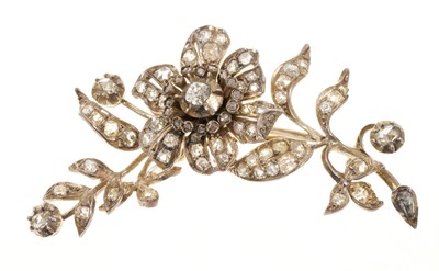 Lot 608 - Antique diamond floral spray brooch with en tremblant flower