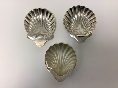 Lot 313 - Two Victorian silver butter shells of conventional form on ball feet, together with one other